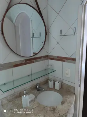 Uma casa de banho em EnCanto dos Ganchos