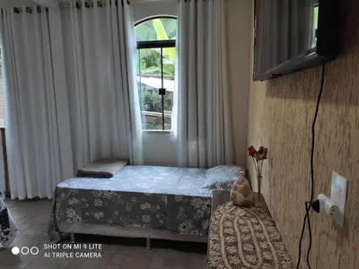 Uma cama ou camas num quarto em EnCanto dos Ganchos