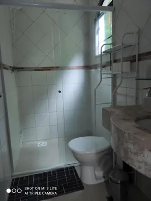 Uma casa de banho em EnCanto dos Ganchos