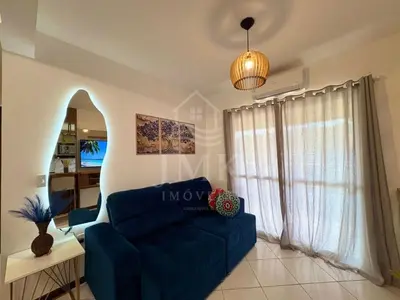 Uma área de estar em Doce Lar