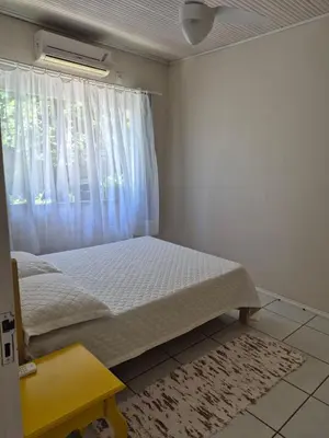 Uma cama ou camas num quarto em CASA Regina