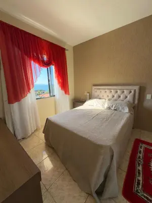 Uma cama ou camas num quarto em Casa Brisa do Mar