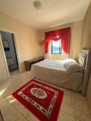 Uma cama ou camas num quarto em Casa Brisa do Mar