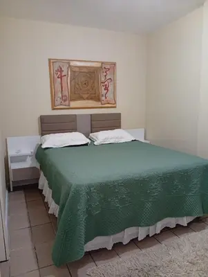 Uma cama ou camas num quarto em Sol na Meia Praia