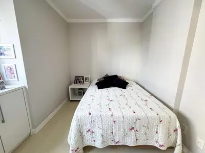 Uma cama ou camas num quarto em Apartamento Avenida Brasil, com dois quartos em Balneário Camboriú