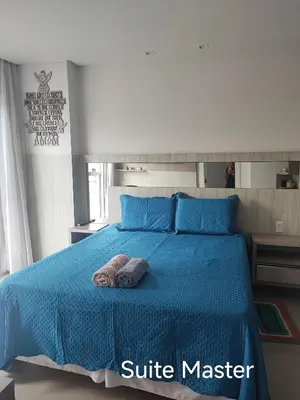 Uma cama ou camas num quarto em AP Alto Padrão