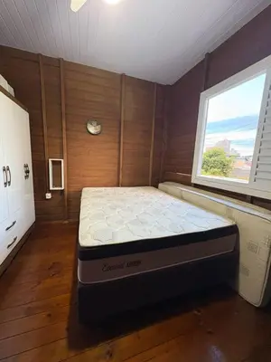 Uma cama ou camas num quarto em Casa de Verão da Carmen