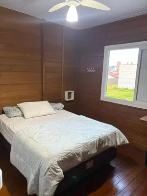 Uma cama ou camas num quarto em Casa de Verão da Carmen