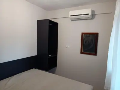 Uma cama ou camas num quarto em Casa para 6 pessoas em Bombinhas-SC - Temporada