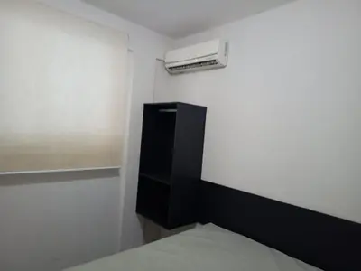 Uma cama ou camas num quarto em Casa para 6 pessoas em Bombinhas-SC - Temporada