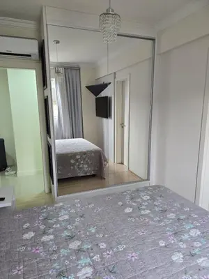 Uma cama ou camas num quarto em Apartamento Família em Meia-Praia, 3 suítes, completo