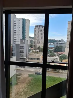 Uma vista geral de Itapema ou a vista da cidade a partir do apartamento