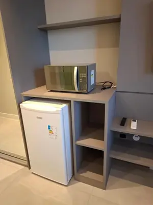 A cozinha ou kitchenette de Flats em ótima localização