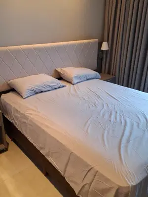 Uma cama ou camas num quarto em Flats em ótima localização