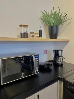 A cozinha ou kitchenette de Studio exclusivo próximo ao Indaiá Eventos