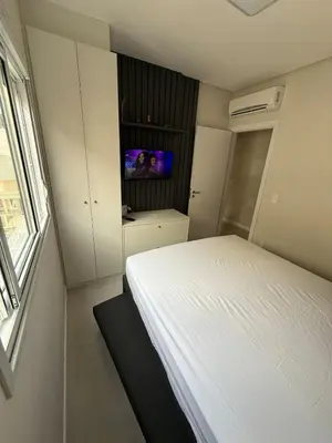 Uma cama ou camas num quarto em Apartamento Carlos Daniela