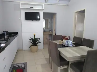 Uma televisão e/ou sistema de entretenimento em Cobertura com dois dormitórios 30m de Mariscal