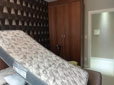 Uma cama ou camas num quarto em Luciano da Silva