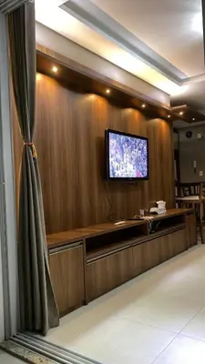 Uma televisão e/ou sistema de entretenimento em Luciano da Silva