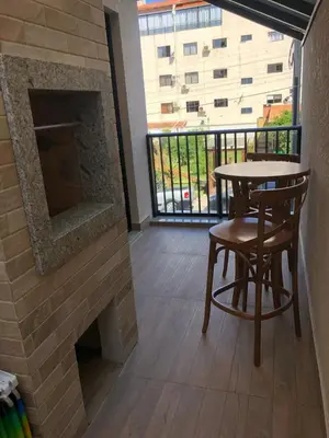 Uma varanda ou terraço em Apartamento Novo em Bombinhas pertinho do Mar