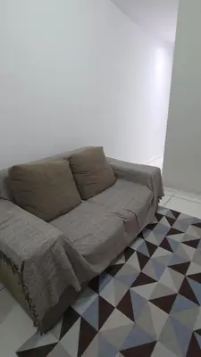 Uma área de estar em Apartamento espaçoso com 2 quartos