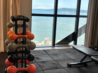 O centro de fitness e/ou as comodidades de fitness de Vista Mar, Suíte Moderna para até 3 Pessoas