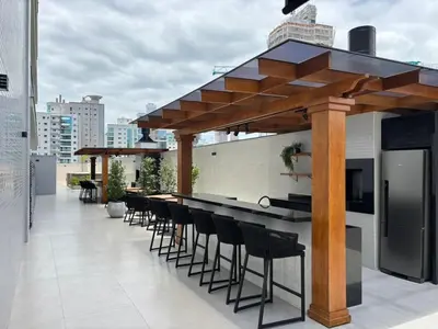 Uma varanda ou terraço em Vista Mar, Suíte Moderna para até 3 Pessoas