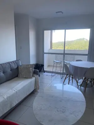 Uma área de estar em Itapema Apartment - Casa Branca