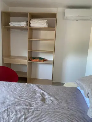 Uma cama ou camas num quarto em Itapema Apartment - Casa Branca