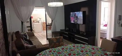 Uma televisão e/ou sistema de entretenimento em Itapema predio rua 292