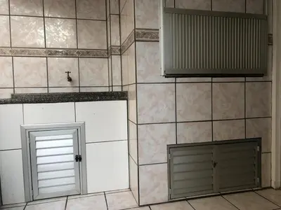 A cozinha ou kitchenette de Apto aconchegante perto da praia