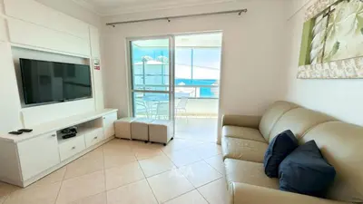 Uma televisão e/ou sistema de entretenimento em ASA | Cobertura Duplex Bello Mar | Piscina | 3QT