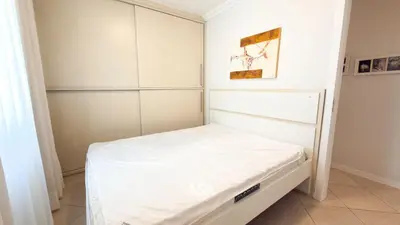 Uma cama ou camas num quarto em ASA | Cobertura Duplex Bello Mar | Piscina | 3QT