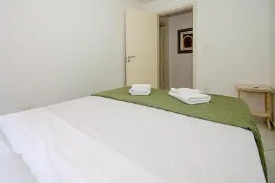 Uma cama ou camas num quarto em Frente Mar Barra Sul com 3 Quartos SG7825