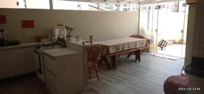Uma cama ou camas num quarto em Itapema predio