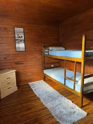 Uma cama ou camas num quarto em Refúgio Exclusivo Pedra Branca