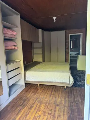 Uma cama ou camas num quarto em Refúgio Exclusivo Pedra Branca