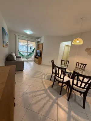 Uma área de estar em Comfortable apartment 350 meters from Bombas Beach