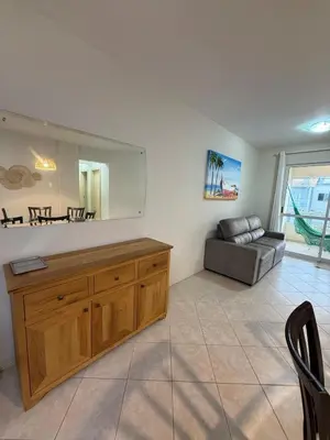 Uma área de estar em Comfortable apartment 350 meters from Bombas Beach