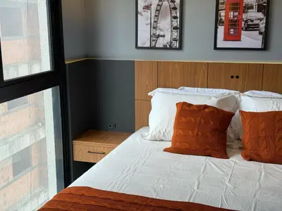 Uma cama ou camas num quarto em For Seasons