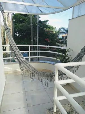 Uma varanda ou terraço em duplex vista mar Mariscal 4 dormitórios
