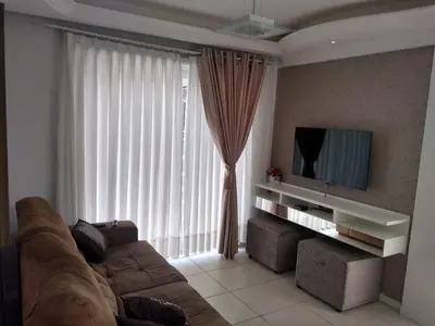 Uma televisão e/ou sistema de entretenimento em duplex vista mar Mariscal 4 dormitórios