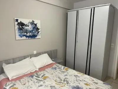 Uma cama ou camas num quarto em duplex vista mar Mariscal 4 dormitórios