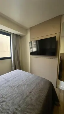 Uma televisão e/ou sistema de entretenimento em 3 Suítes, Churrasqueira e Piscina no Rooftop