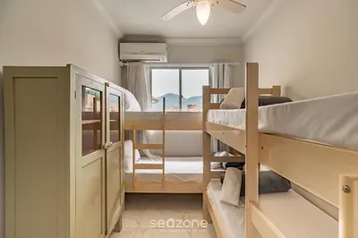Uma cama ou camas num quarto em Apto 2Q a 260m da praia do Canto - Itapema RTL0302
