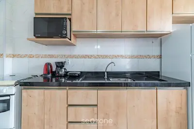 A cozinha ou kitchenette de Apto 2Q a 260m da praia do Canto - Itapema RTL0302