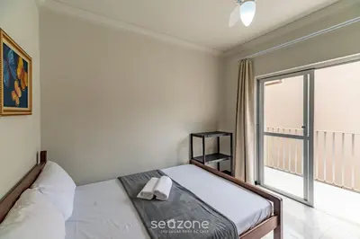 Uma cama ou camas num quarto em Apto 2Q a 260m da praia do Canto - Itapema RTL0302