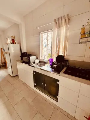 A cozinha ou kitchenette de Quarto privativo CASAL duplo em hostel pe na areia- BC