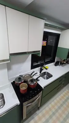 A cozinha ou kitchenette de Excelente apartamento com 3 quartos disponíveis Palmas SC próximo a praia - 2 quartos e sala com ar condicionado