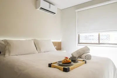 Uma cama ou camas num quarto em SLE72 - 2 Dorm, Climatizado, Smart TV, Barra Sul